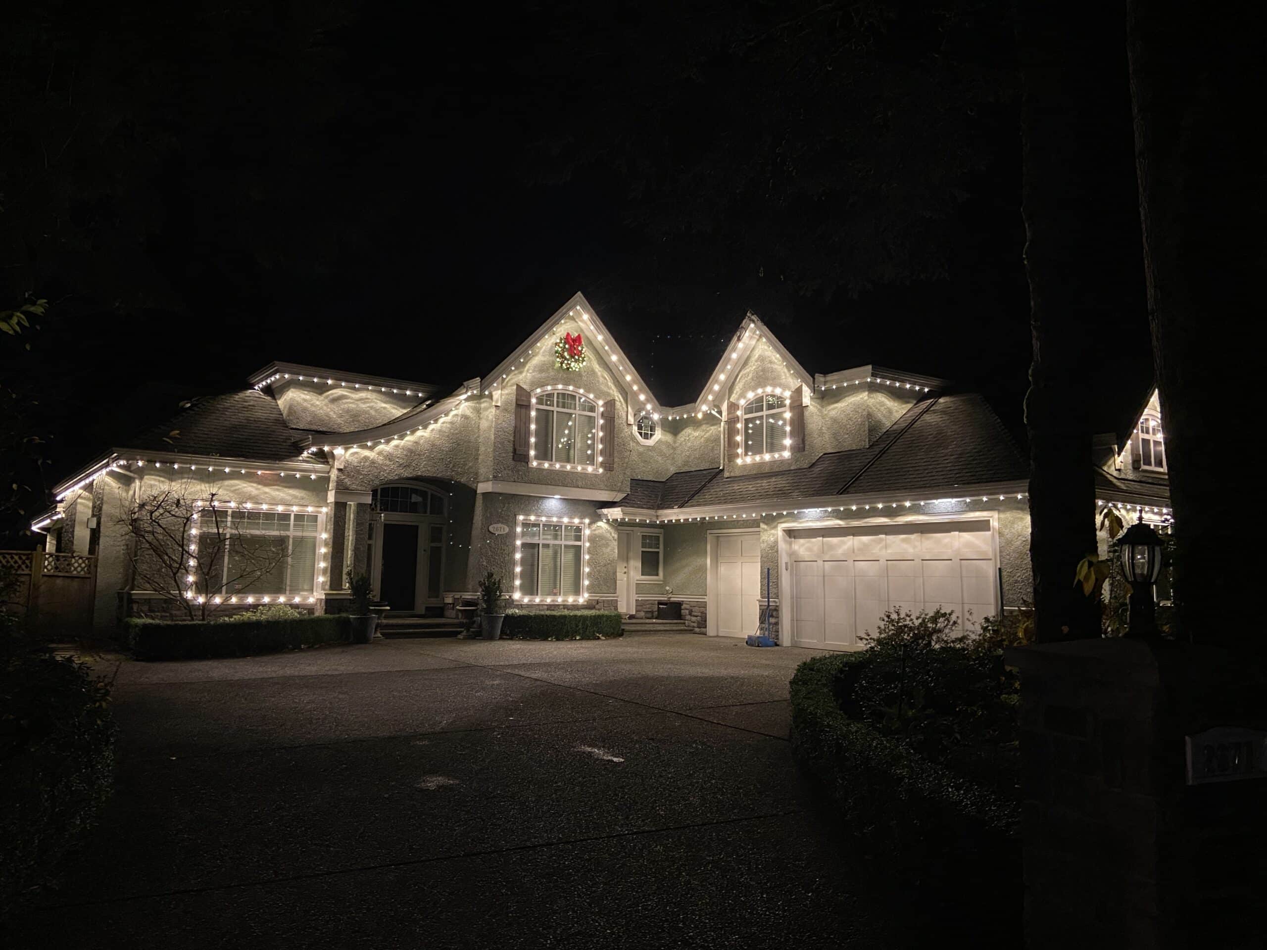 Premium warm-white roofline lighting on a Vancouver home