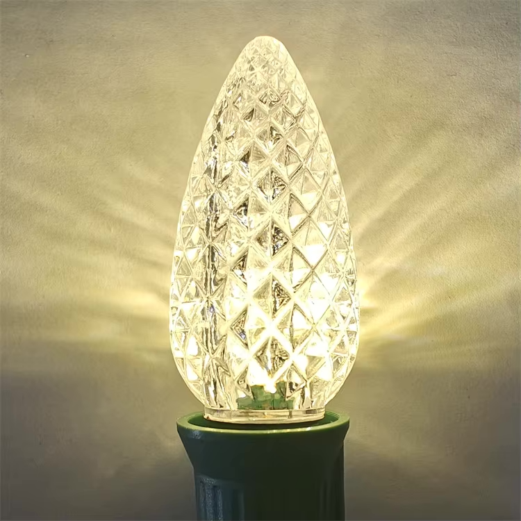 Warm White C9 LED bulb close-up showing soft golden glow